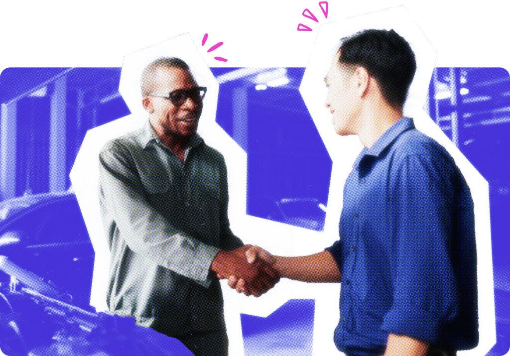 Mechanic shaking hands with a customer