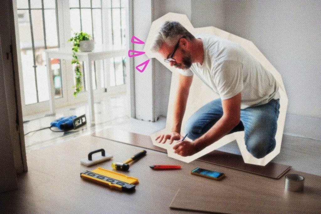 Contractor installing wood flooring